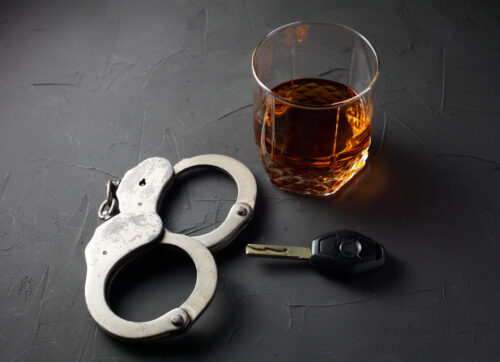 DUI DWI handcuffs alcohol car keys drunk driving